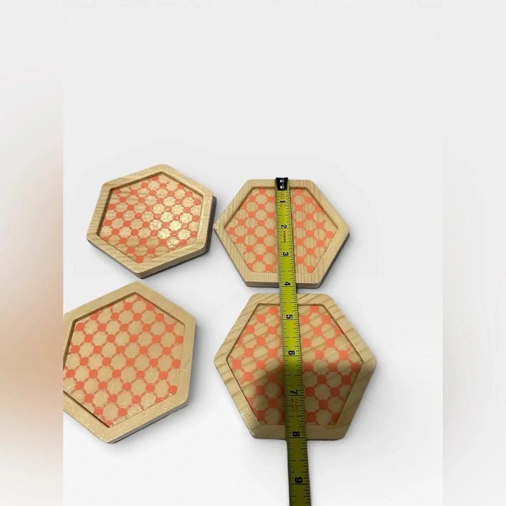 4 wooden drink coasters with design